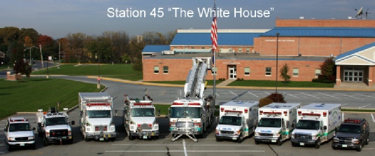 Fleetwood Volunteer Fire Company Station 45 "The White House" with emergency vehicles parked out front.